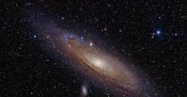 Столкновение карликовых галактик сформировало Андромеду-II