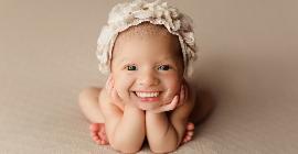 Забавно и пугающе одновременно: фото новорожденных с улыбкой в 32 зуба