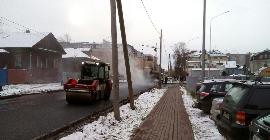 В Архангельск пришла зима, дорожные службы приступили к укладке асфальта