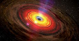 Ученые наблюдали самую далекую черную дыру, поглощающую звезду